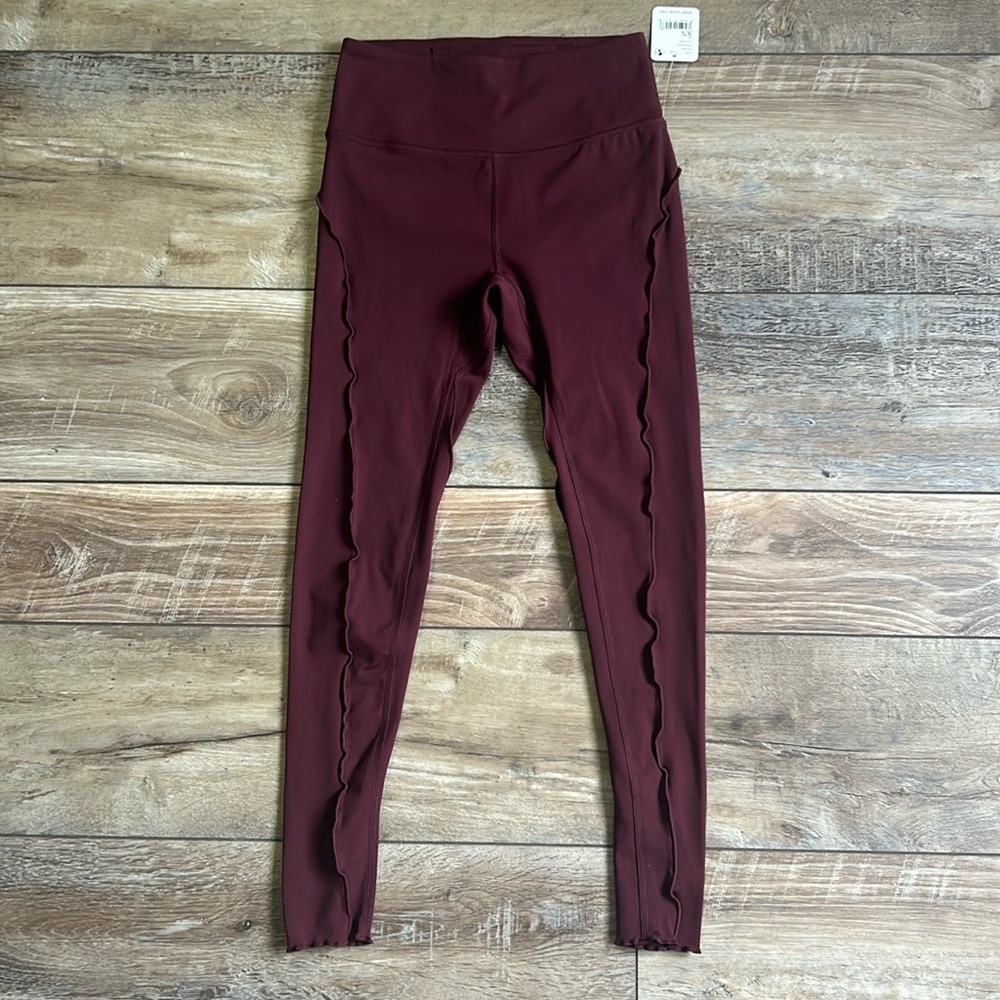 NWT FP Movement Hearts Aflutter Leggings Fig Jam XS